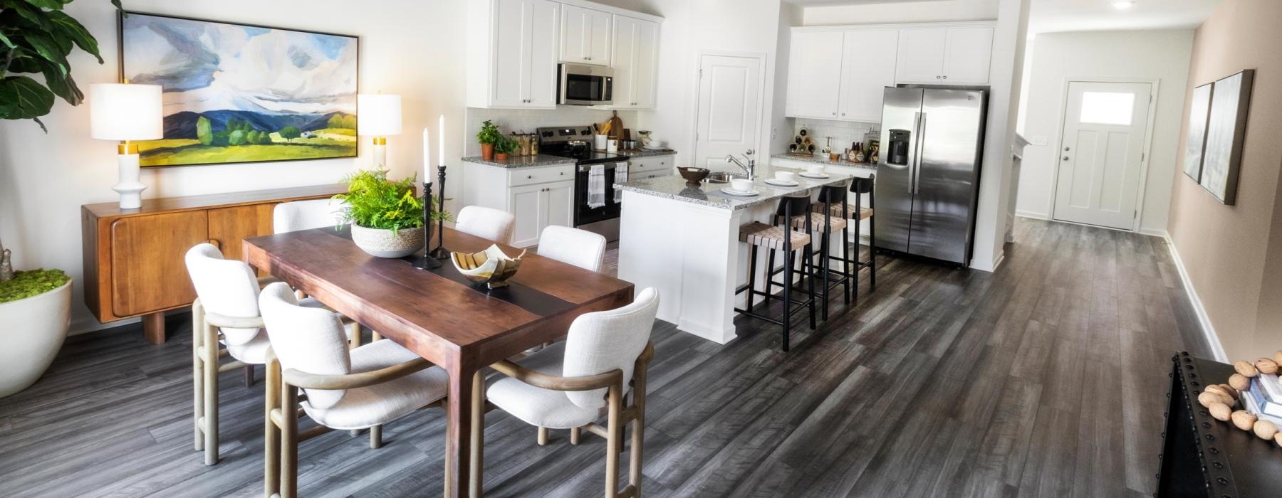 a kitchen with a dining table